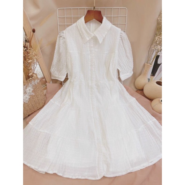 Đầm baby doll đũi cổ trụ.