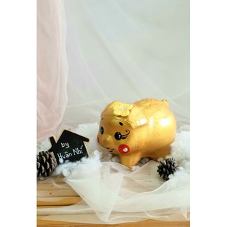 Heo đất handmade - heo sơn nhũ vàng.