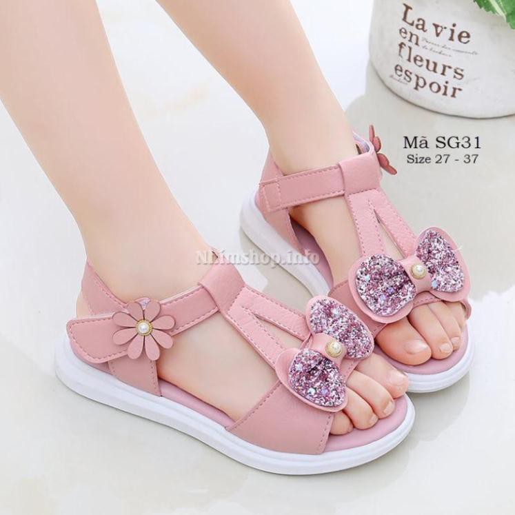 Dép sandal bé gái 3 - 12 tuổi gắn nơ màu hồng xinh xắn da mềm đi học đi chơi mùa hè thời trang và phong cách SG31