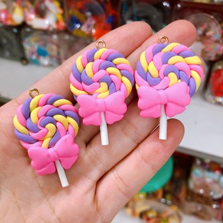 Charm kẹo mút nơ