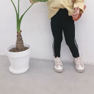 Quần legging sọc