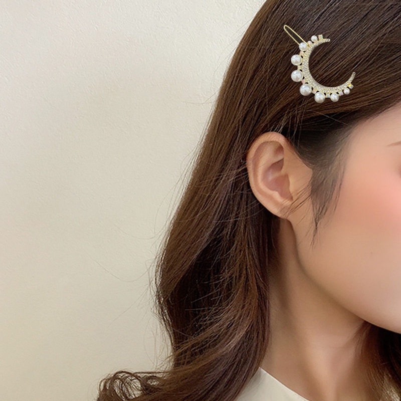 Kẹp tóc hình mặt trăng đính đá lấp lánh sang trọng