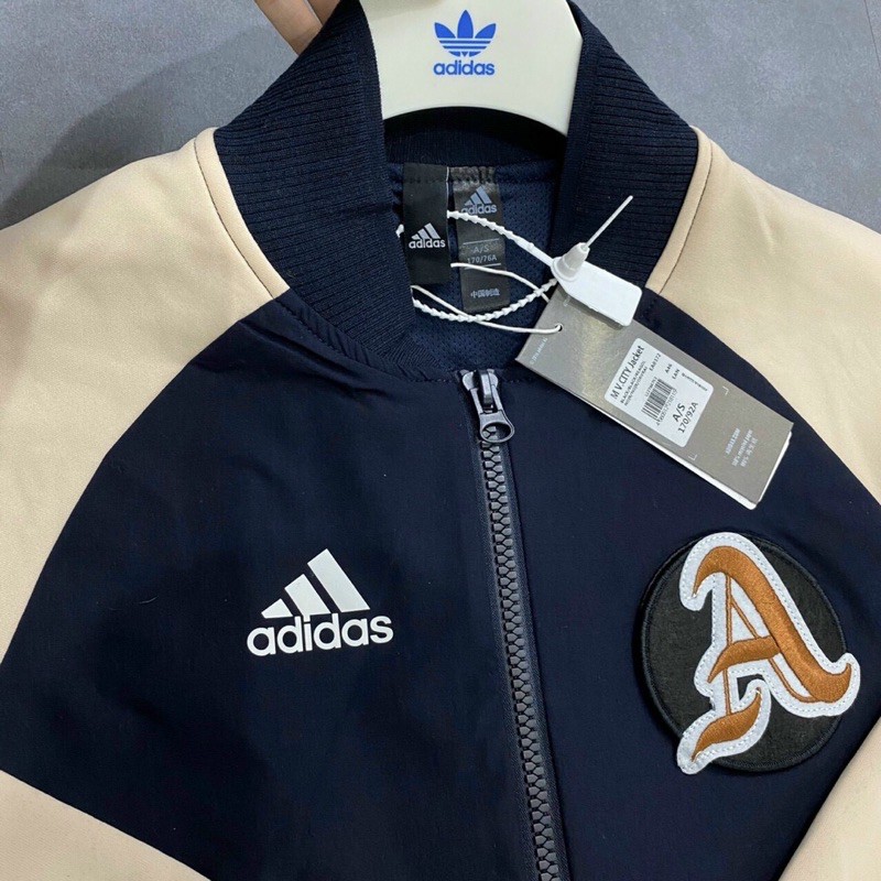Áo thể thao adidas hit