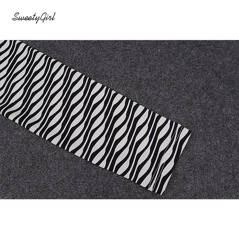 Áo crop top tay dài cổ tròn hở lưng in họa tiết kẻ sọc màu tương phản thời trang cho nữ