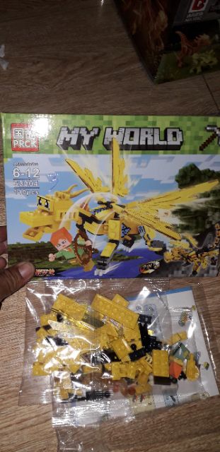 Lắp ráp 1 hộp LegoMyWord Rồng 63004 có nhiều chi tiết bằng nhựa ABS