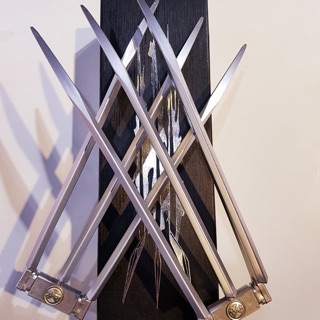 Vuốt đồ chơi wolverine