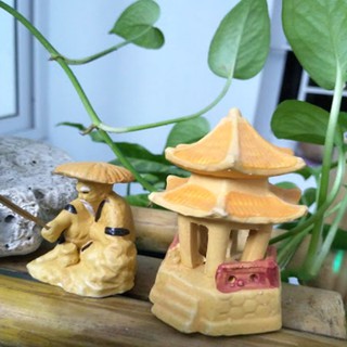 Tượng ông ngư+Tháp vàng