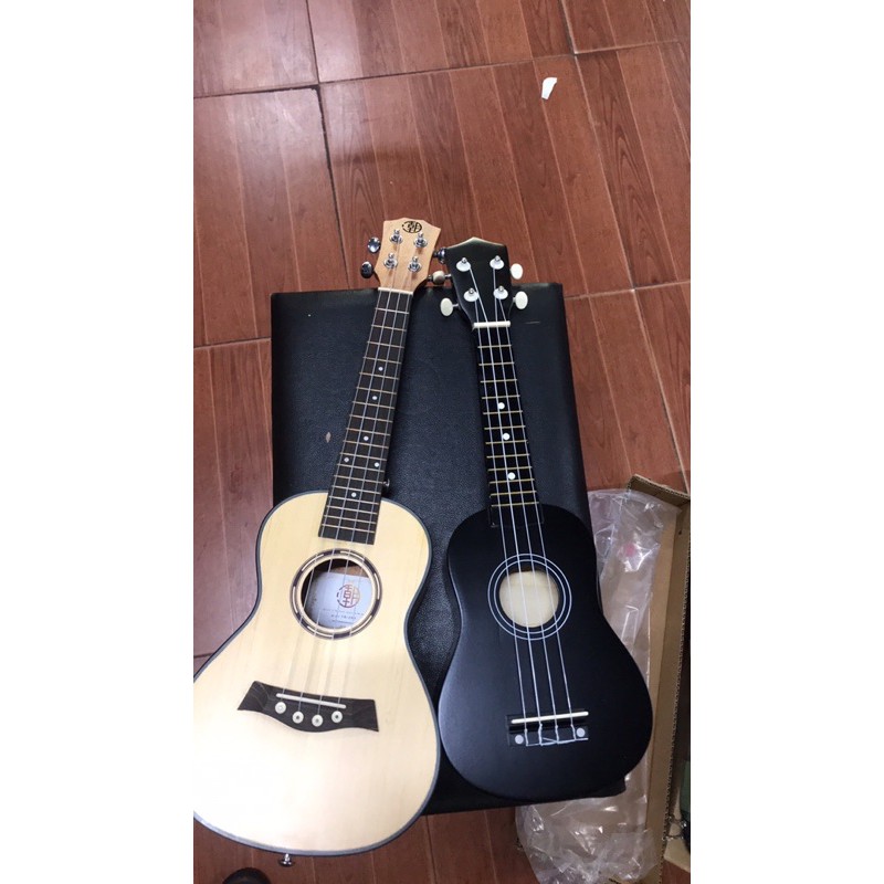 Đàn ukulele 23 concert mặt gỗ thịt nguyên tấm.