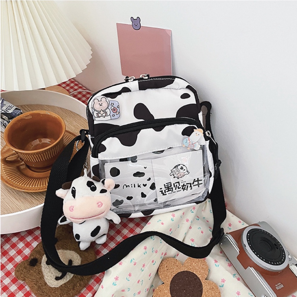 Túi đeo chéo bò sữa