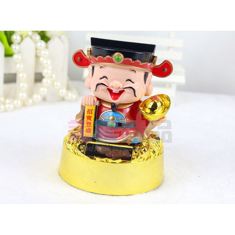 Tượng thần tài gật đầu năng lượng