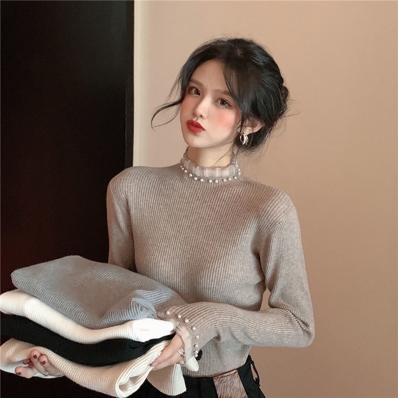 Áo dệt kim tay dài cổ cao màu đen thời trang nữ