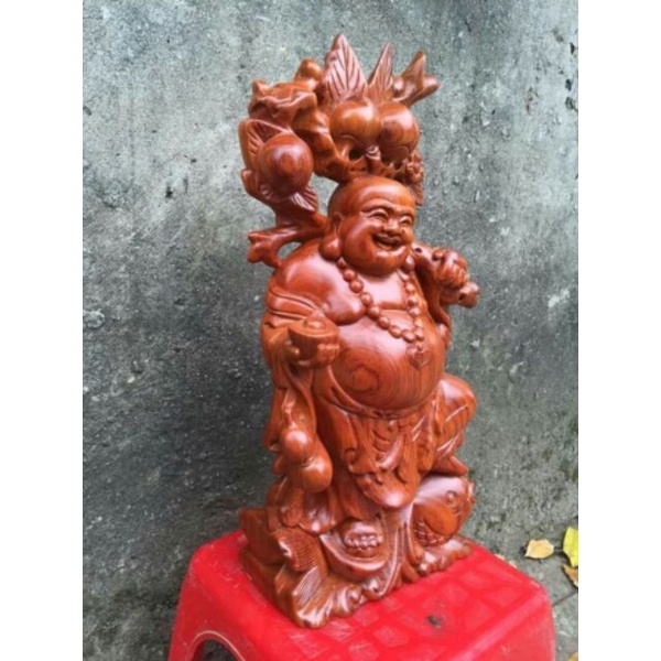 tượng di lặc vác cành đào