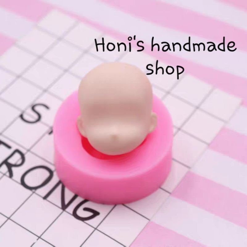 Khuôn silicon mặt búp bê hồng có tai