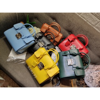 Túi furl@ tay cầm da thật