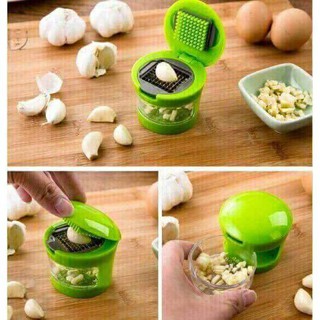 DỤNG CỤ DẬP TỎI.
