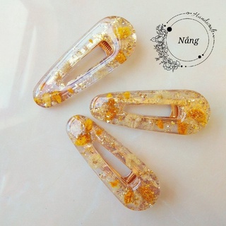 Kẹp tóc hoa baby vàng