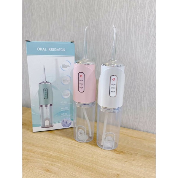 TĂM NƯỚC ORAL IRRIGATOR HÀNG NỘI ĐỊA TRUNG CHUẨN SỊN