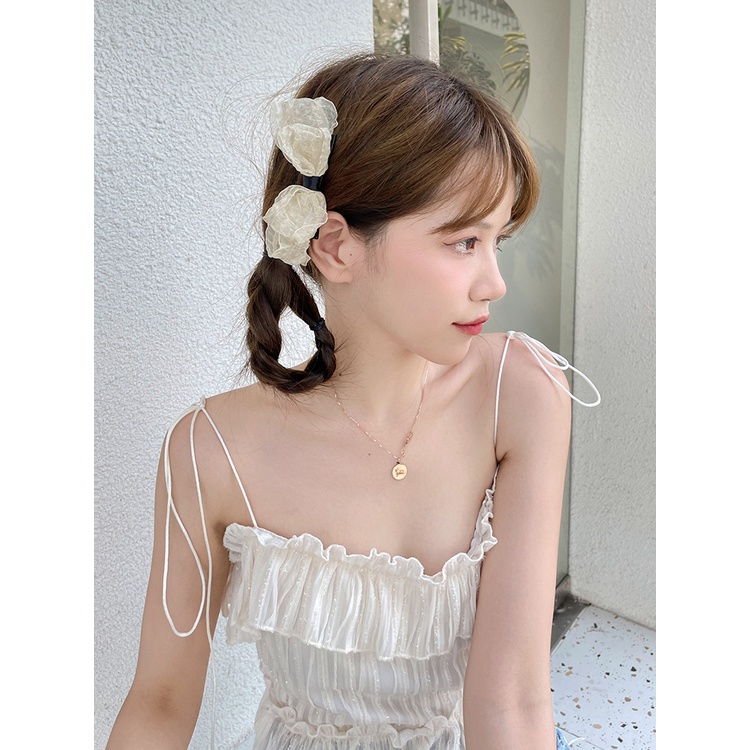 Kẹp tóc thắt nơ hai bên xu hướng thịnh hành Hàn Quốc