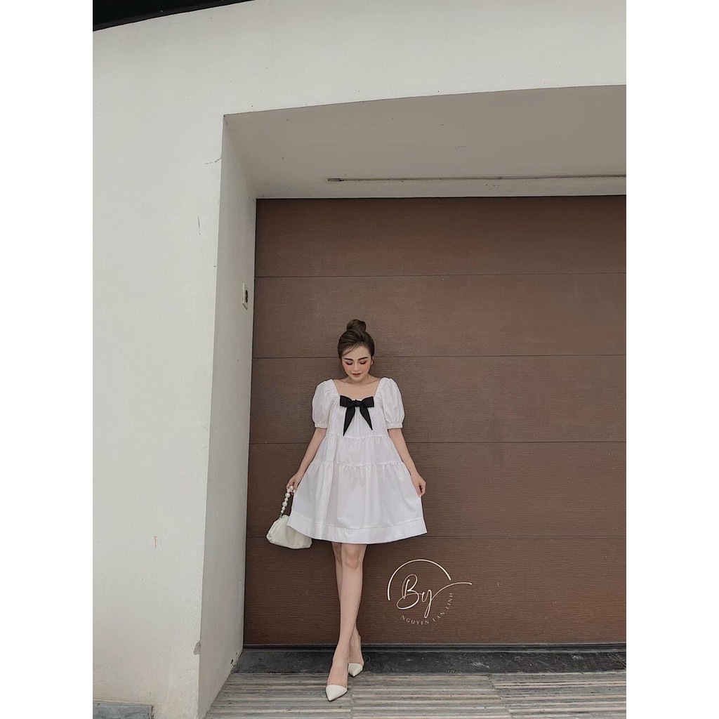 Váy đầm nữ dáng babydoll màu trắng cột nơ cổ tay bồng nữ tính