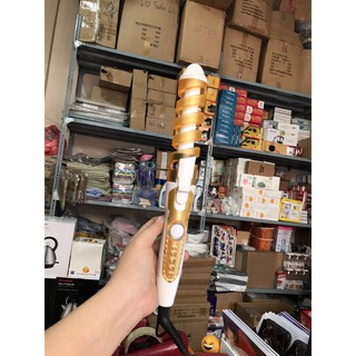 Lược uốn xoăn tóc