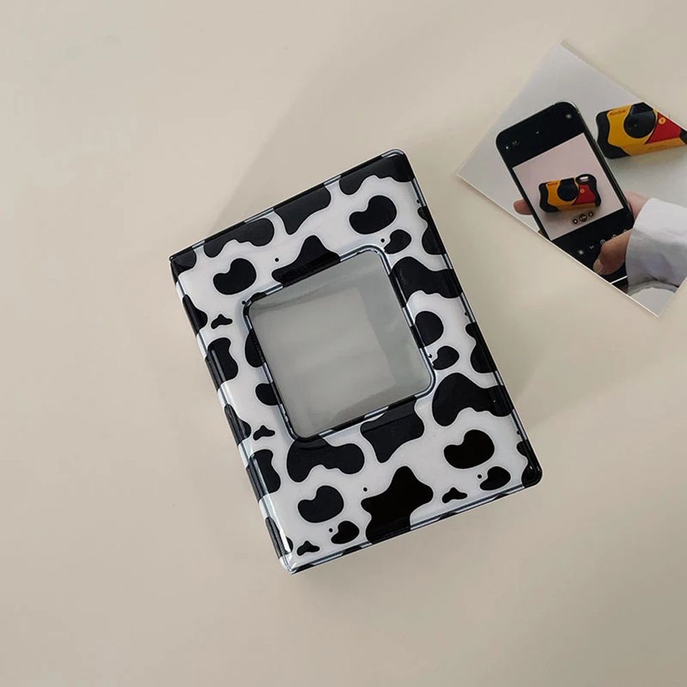 Album đựng ảnh mini gồm 16 trang thiết kế bìa họa tiết bò sữa kích cỡ 8.5×11×2.6cm