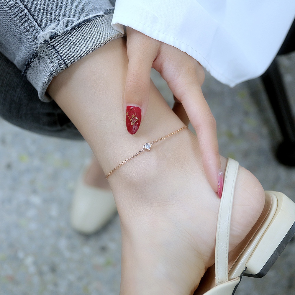 Lắc chân nữ titan 1 hạt đá trắng O1-202A - CAM KẾT KHÔNG GỈ, KHÔNG BAY MÀU - BẢO HÀNH 12 THÁNG.