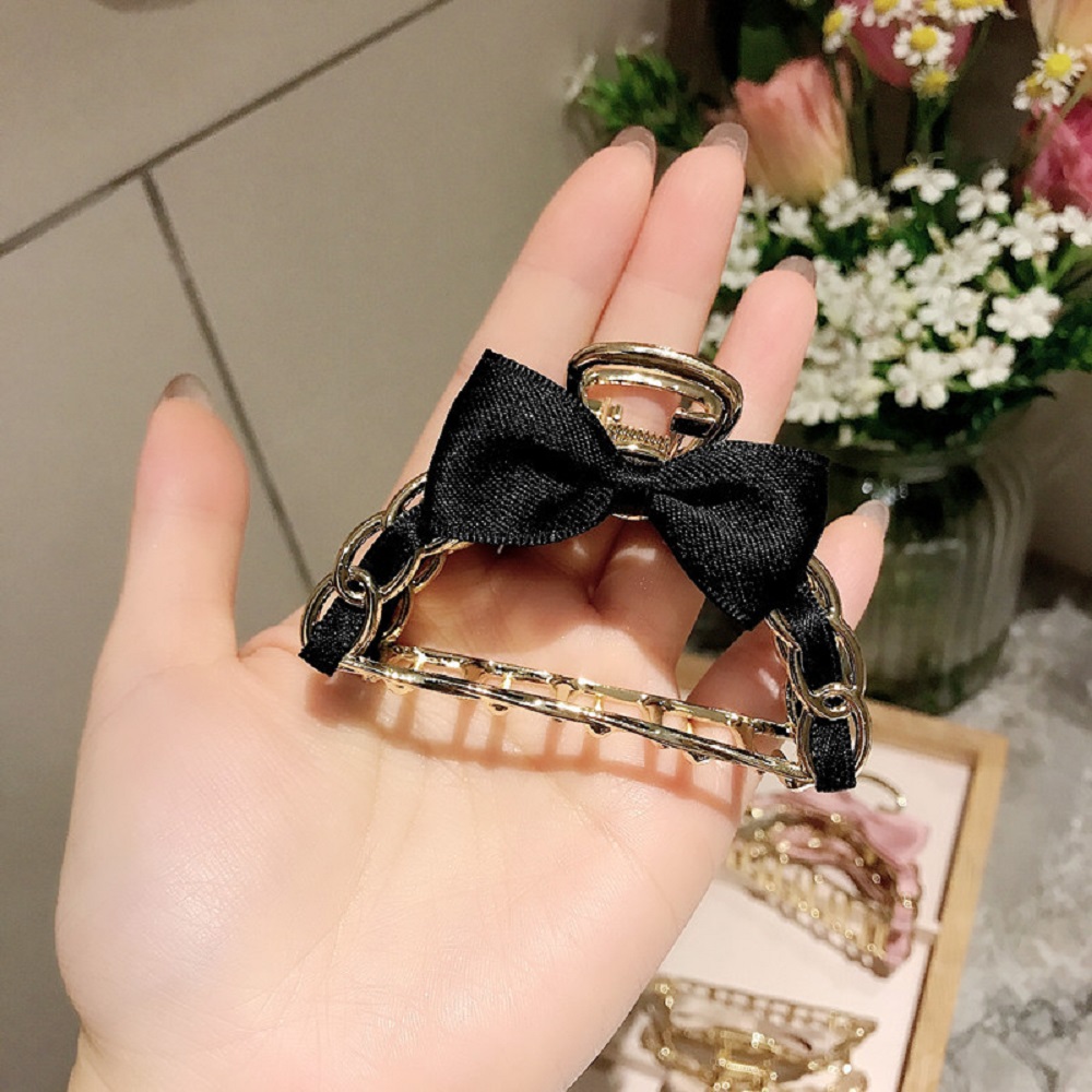 Kẹp tóc hình nơ làm từ hợp kim màu trơn thời trang nữ dễ thương