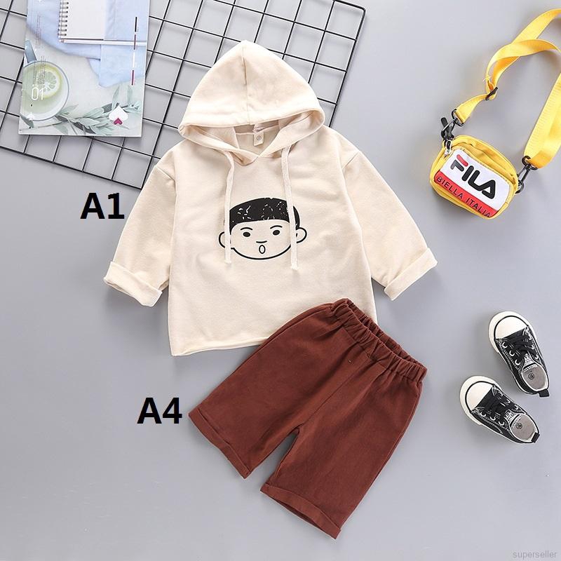 Áo hoodie in họa tiết hoạt hình + chân váy sọc caro thời trang mùa thu