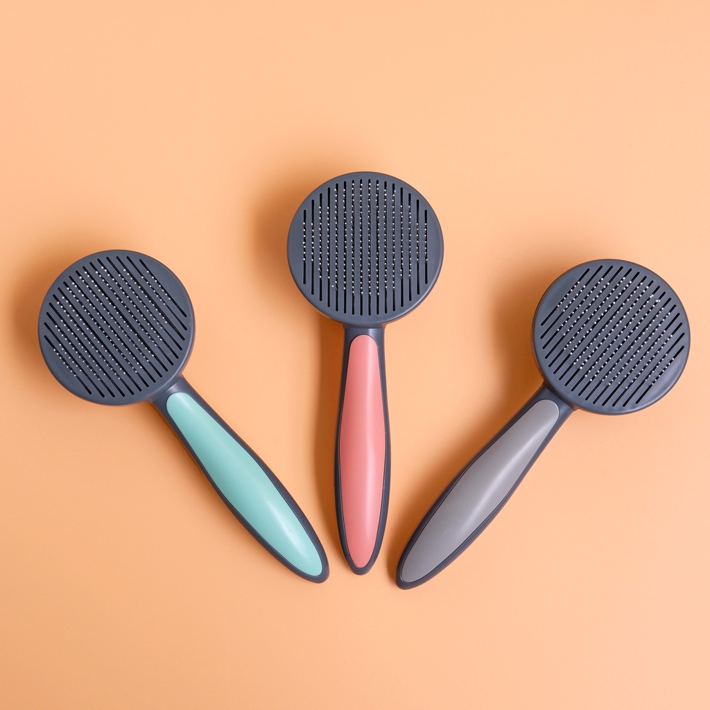 Lược chải lông mèo có nút bấm cao cấp Donut PetX