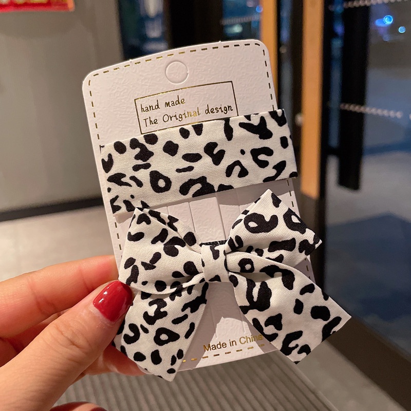 Kẹp tóc hình nơ họa tiết da báo phong cách retro dành cho nữ