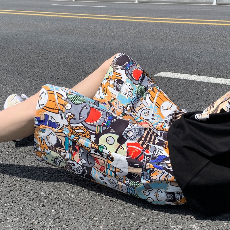 Quần ngắn họa tiết hoạt hình thời trang đi biển dành cho nam