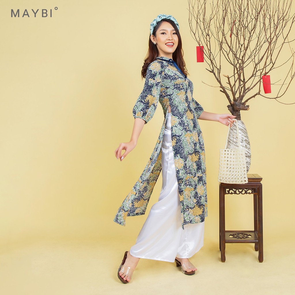 Áo dài Maybi hoạ tiết nền xanh phối nơ cổ