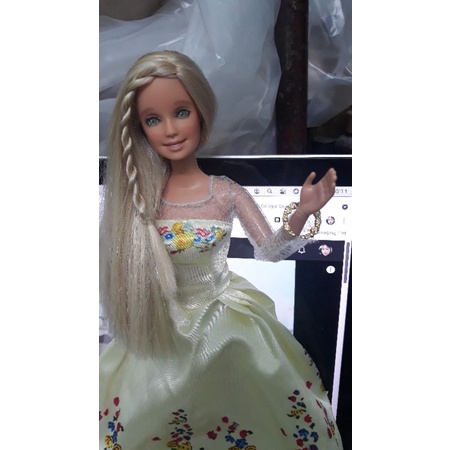 Búp bê barbie đã qua sử dụng