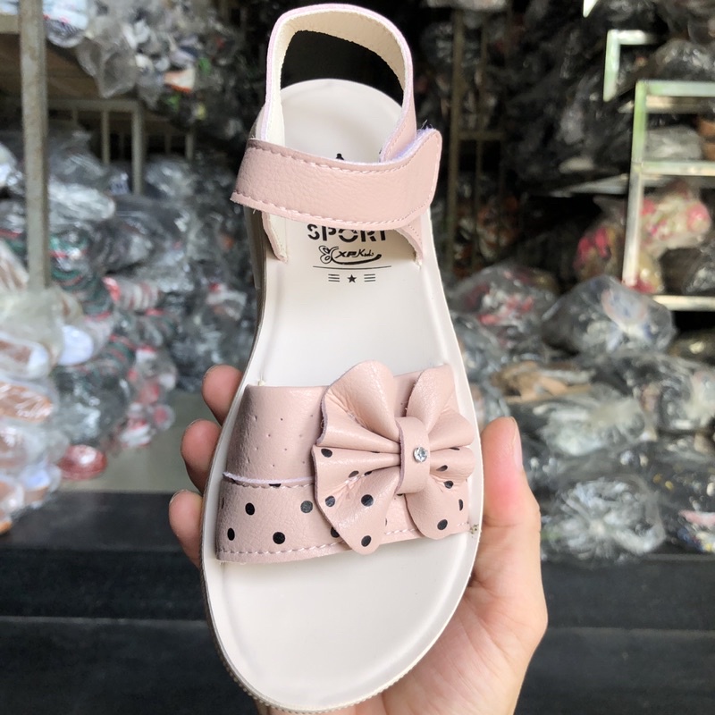 Dép trẻ em sandal bé gái hình nơ chấm bi bản ngang , quai hậu học sinh da đế cao su nhẹ xpa giá rẻ