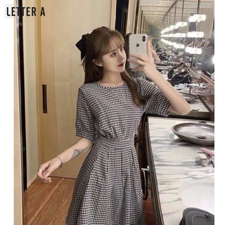 Đầm caro đính cúc sau hở lưng nhẹ nhàng