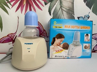 Máy hâm sữa Yumi tặng bình sữa