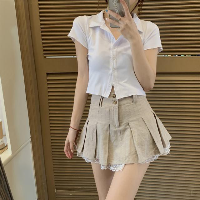 Ready Stock Korean hot girl polo collar cardigan short-sleeved T-shirt + two-piece design cotton and linen lace stitching pleated skirt