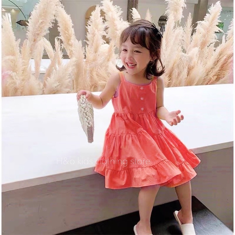 Váy vàng cam xoè tầng cho bé gái