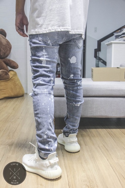 Bleached waxed zipper jeans