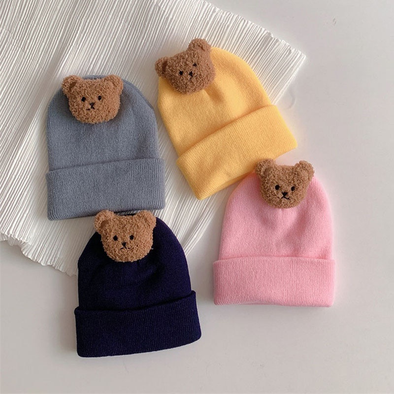 Mũ Beanie Đan Len Mềm Mại Màu Trơn Giữ Ấm Mùa Đông In Hình Gấu Kiểu Hàn Quốc Cho Bé Sơ Sinh