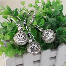 Móc khoá hình chuông trắng giá sỉ