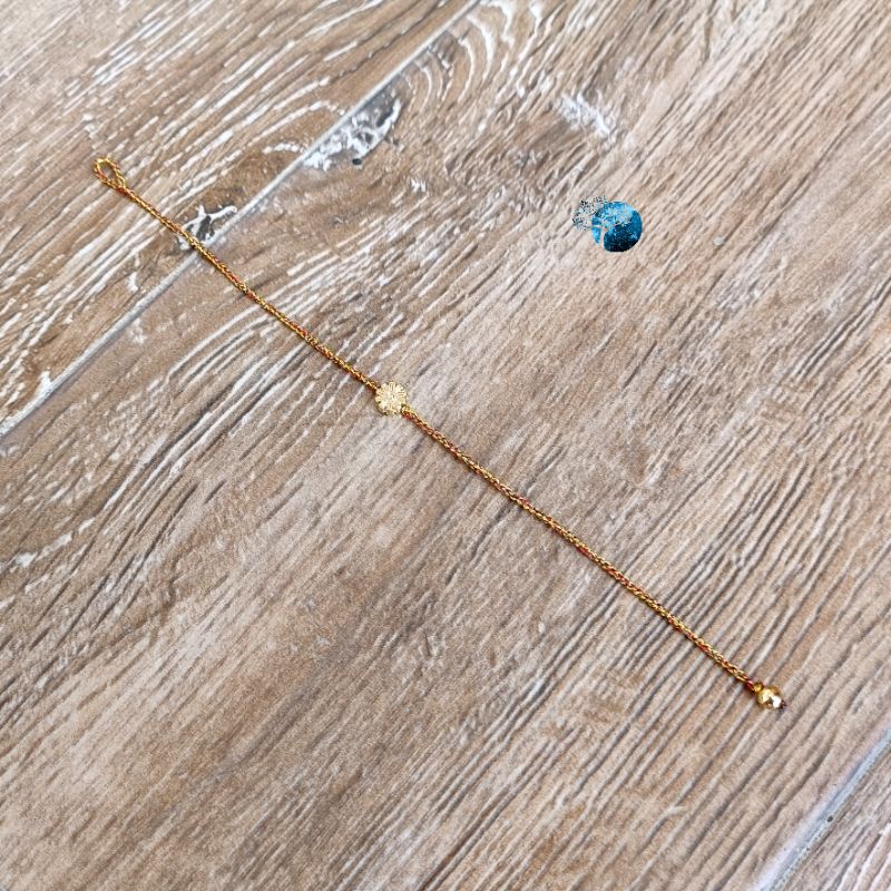 Vòng tay tết dây chỉ ngũ sắc mix hoa đồng tiền vàng kim