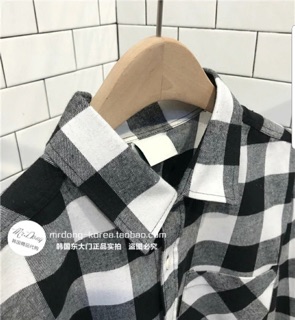 Áo sơ mi sọc đen trắng oversize