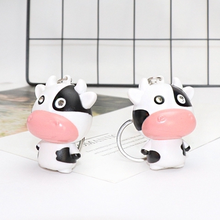 Móc khóa hình chú bò sữa có đèn LED
