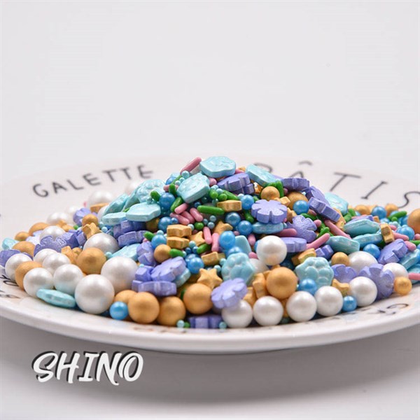 Sprinkle mix tím vàng trắng xanh hộp 85 gam