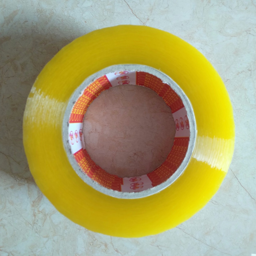 Băng dính 0,4kg/ 1cuộn lõi giấy dùng để đóng gói hàng
