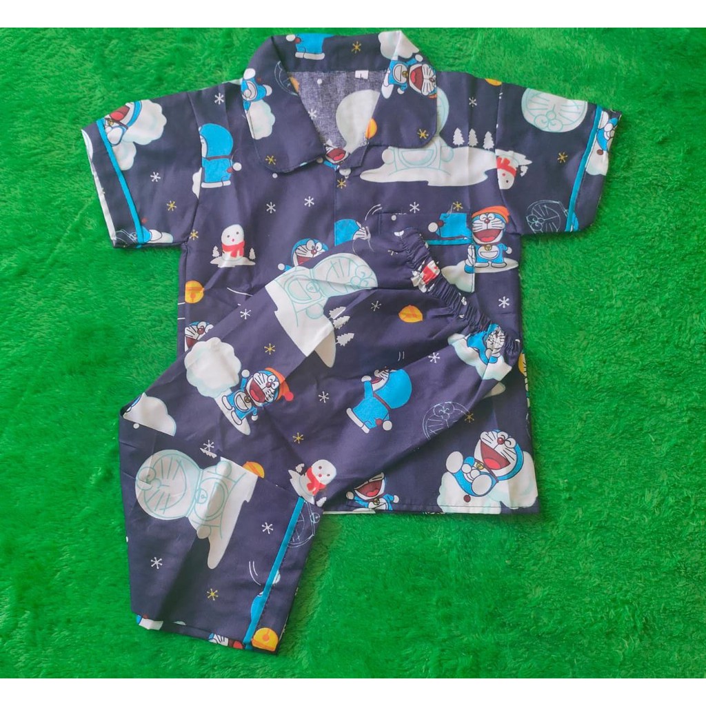 Bộ đồ ngủ họa tiết Doraemon xinh xắn dành cho bé 1-12 tuổi