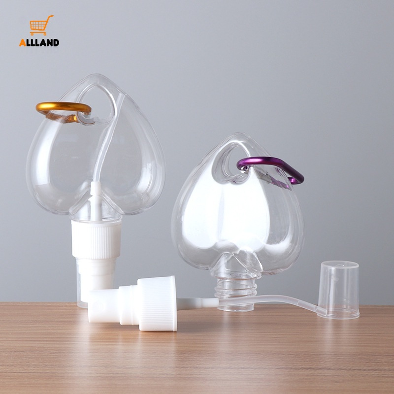 Chai đựng mỹ phẩm rỗng hình trái tim có móc treo tiện lợi màu ngẫu nhiên 50ml