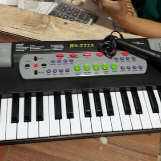 Đàn organ có mic co bé