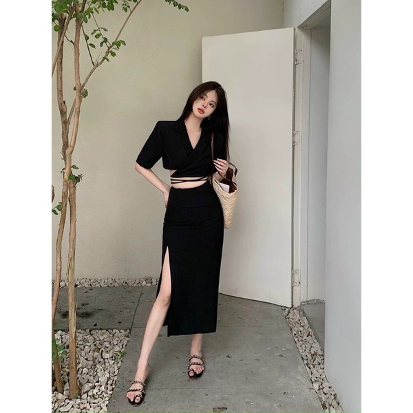 Set áo croptop cổ vest quấn eo + chân váy midi xẻ đen